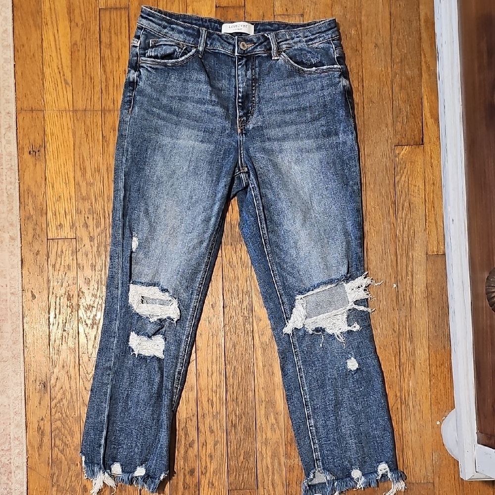 Distressed Blue Jeans
